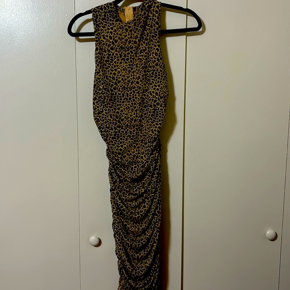 NWOT super cute sparkly with stretch cheetah print